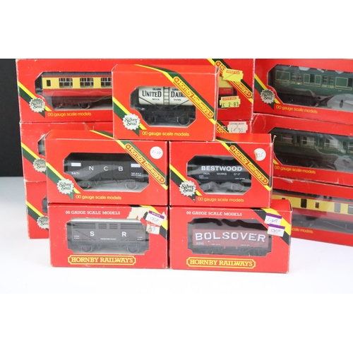 23 - 29 Boxed OO gauge items of rolling stock to include 27 x Hornby and 2 x Palitoy Mainline, featuring ... 