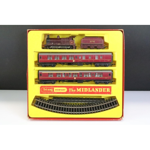 30 - Five boxed Triang / Hornby OO gauge train sets to include The Midlander (no box lid), RS59, RS8 The ... 