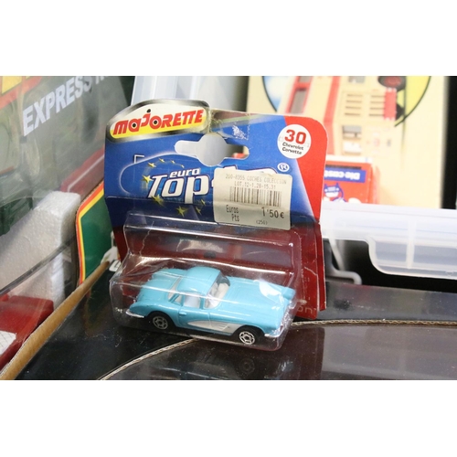 1196 - Collection of approximately 30 boxed / carded diecast models to include Corgi, Corgi Public Transpor... 