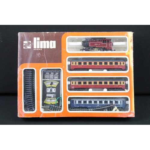 216 - Three boxed Lima OO gauge train sets to include 104507AW, 4620P and 104407, all appear to be complet... 