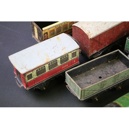 223 - Quantity of play worn O gauge model railway to include Hornby locomotives, rolling stock etc plus a ... 