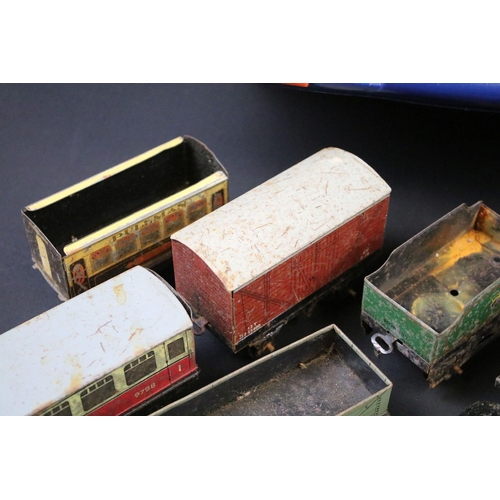 223 - Quantity of play worn O gauge model railway to include Hornby locomotives, rolling stock etc plus a ... 