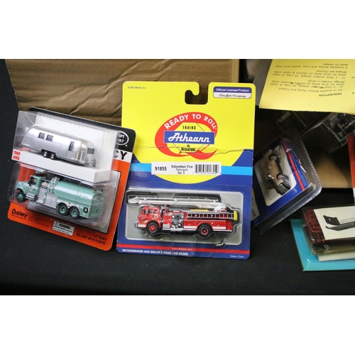 227A - Large collection of boxed / carded HO/OO gauge plastic & diecast trackside model vehicles to include... 