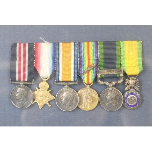 136 - Two British WW1 / WW2 miniature medal group to include a World War One Military Medal group and a Wo... 