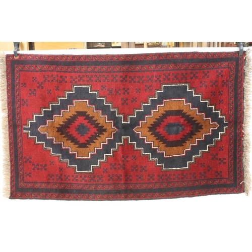 692A - New Baluchi rug, 145cm x 88cm