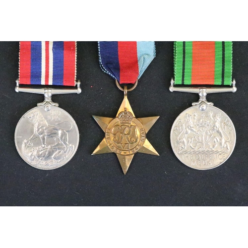 13 - A British Full Size World War Two Medal Trio To Include The 1939-1945 British War Medal, The Defence... 