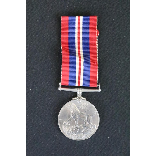 13 - A British Full Size World War Two Medal Trio To Include The 1939-1945 British War Medal, The Defence... 