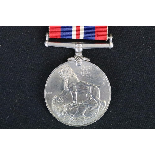 13 - A British Full Size World War Two Medal Trio To Include The 1939-1945 British War Medal, The Defence... 