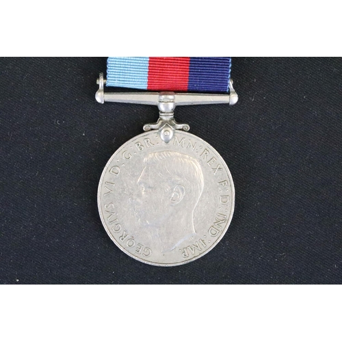 4 - A British full size World War Two medal group to include The 1939-45 British war medal, the Defence ... 