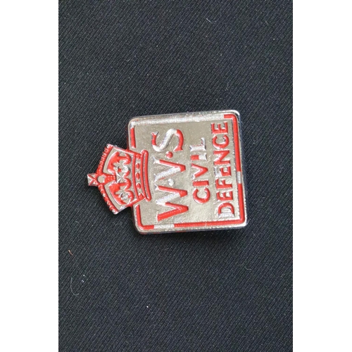 5 - A small group of British World War Two era badges to include silver examples.