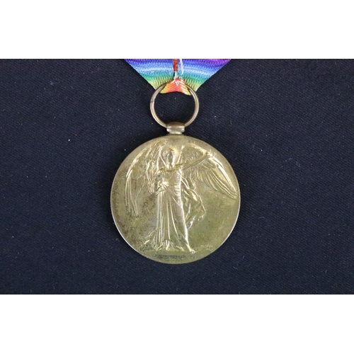 6 - A full size British World War One medal pair to include the Victory medal and the British war medal,... 