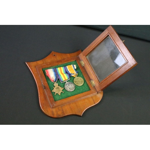 102 - A British World War One full size medal trio to include the Victory medal, the 1914-1918 British War... 