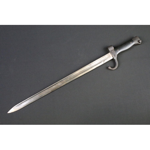 103 - A military hooked quillion bayonet complete with scabbard and frog.