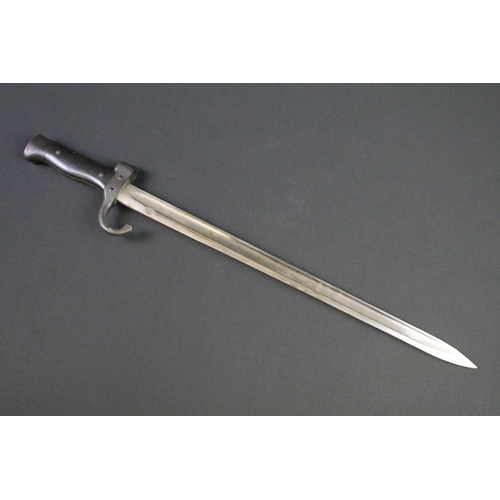 103 - A military hooked quillion bayonet complete with scabbard and frog.