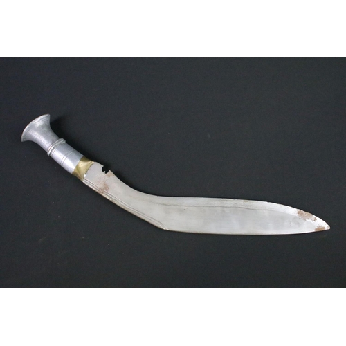 104 - A vintage Gurkha Kukri knife complete with scabbard adorned with two Royal Marines badges.