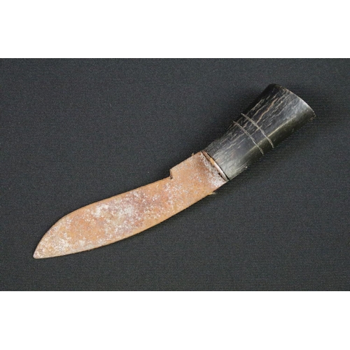 104 - A vintage Gurkha Kukri knife complete with scabbard adorned with two Royal Marines badges.