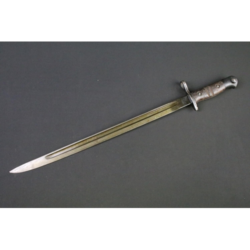 112 - A World War One 1913 pattern bayonet complete with original leather scabbard.