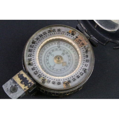 113 - A British World War Two MK.3 marching compass, maker marked for T.G. & Co, dated 1939 and marked wit... 