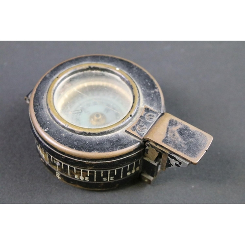 113 - A British World War Two MK.3 marching compass, maker marked for T.G. & Co, dated 1939 and marked wit... 