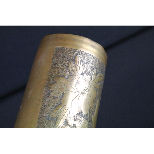 116 - A World War One trench art vase decorated with floral pattern formed from a brass artillery shell, d... 