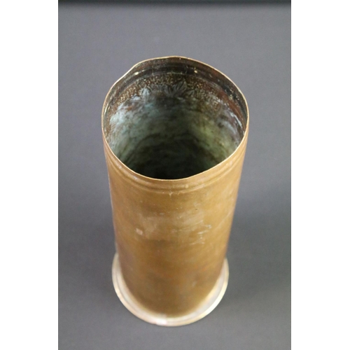 116 - A World War One trench art vase decorated with floral pattern formed from a brass artillery shell, d... 