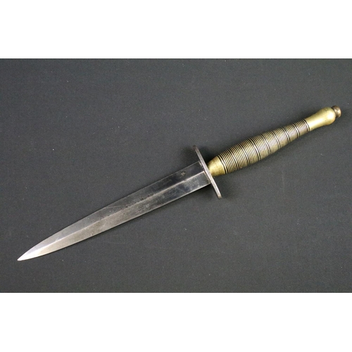 117 - A British World War Two Fairbairn sykes commando dagger, sterile with no markings complete with orig... 