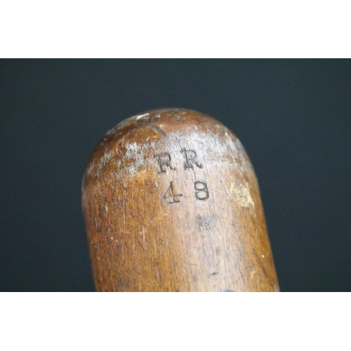 128 - A British World war Two War Department issued wooden truncheon, marked WD together with the broad ar... 