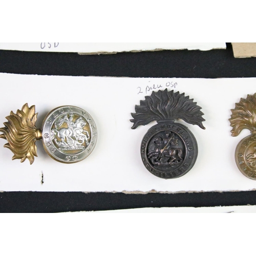 91 - A collection of mainly British military cap and collar badges to include officers examples.