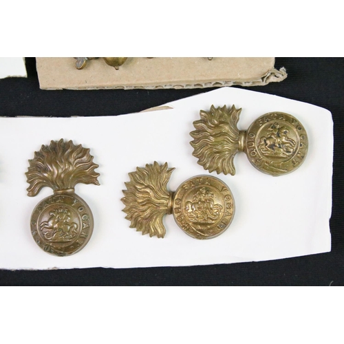 91 - A collection of mainly British military cap and collar badges to include officers examples.