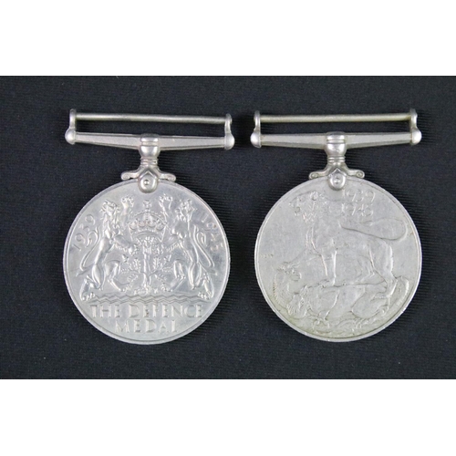 94 - A British World War Two full size medal pair to include the 1939-45 British War medal and the Defenc... 