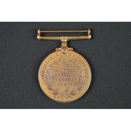 98 - A British full size World War One medal group of three to include the Victory Medal, the 1914-1918 B... 