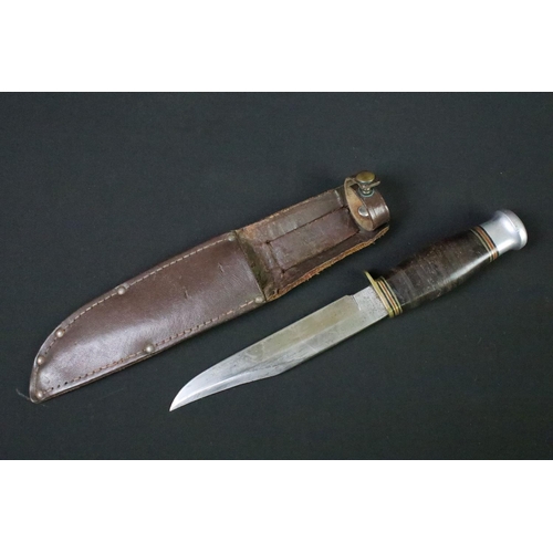 101 - A collection of six vintage sheath knives to include a Milbro examples together with a small group o... 