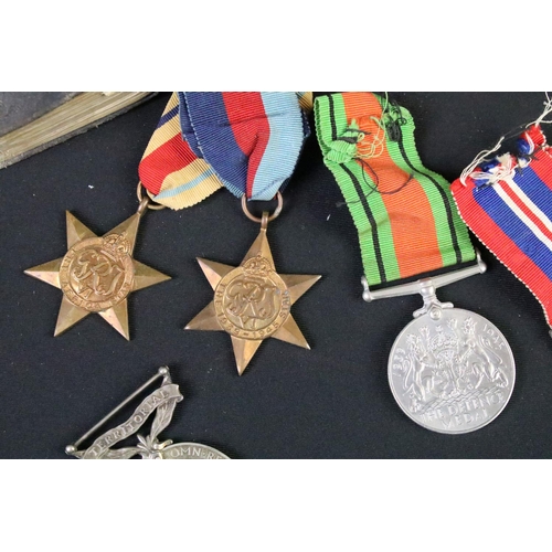 107 - Collection of full size British medals to include a trio of World War One medals issued to SE-22023 ... 