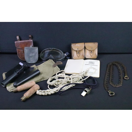 120 - A group of mixed militaria to include a World War One folding trench saw, sandwich case within leath... 