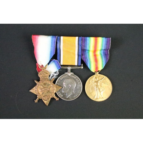 152 - First World War full size British Service medal trio to include 1914-1915 star, war medal and defenc... 