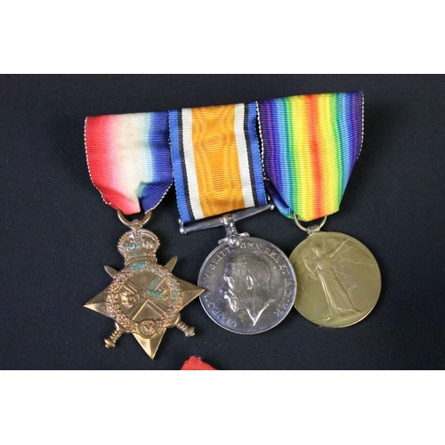 153 - First World War full size British Service medal trio to include 1914-15 star, war medal and victory ... 