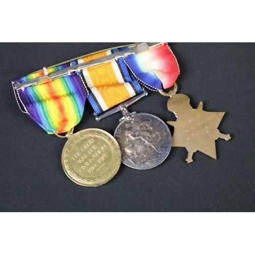 153 - First World War full size British Service medal trio to include 1914-15 star, war medal and victory ... 