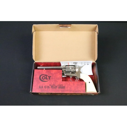 171 - A Colt 45 CO2 pellet air pistol together with CO2 cartridges.