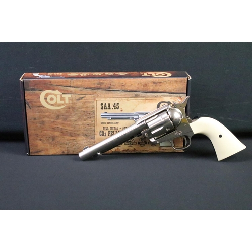 171 - A Colt 45 CO2 pellet air pistol together with CO2 cartridges.