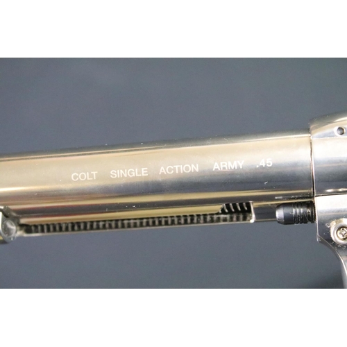 171 - A Colt 45 CO2 pellet air pistol together with CO2 cartridges.