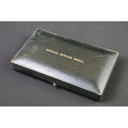 221 - A British Imperial Service Medal Edward VII 1903-1910 within original fitted case.