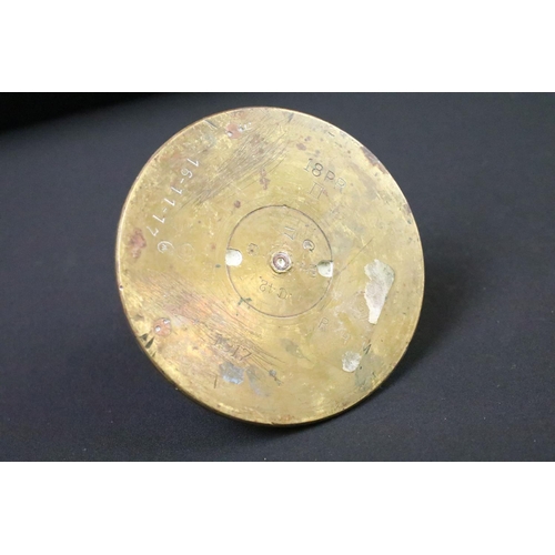 227 - A World War One trench art paper weight made from an artillery fuse and the base of an 18lb shell ca... 