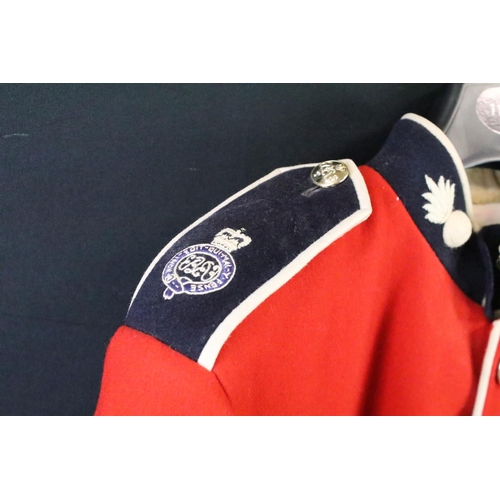 231 - A British military Grenadier Guards tunic complete with Queens crown  buttons and badges.