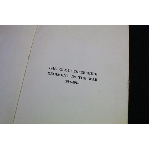 234 - A large collection of military reference books to include Badge, Button, Medal and sword examples.