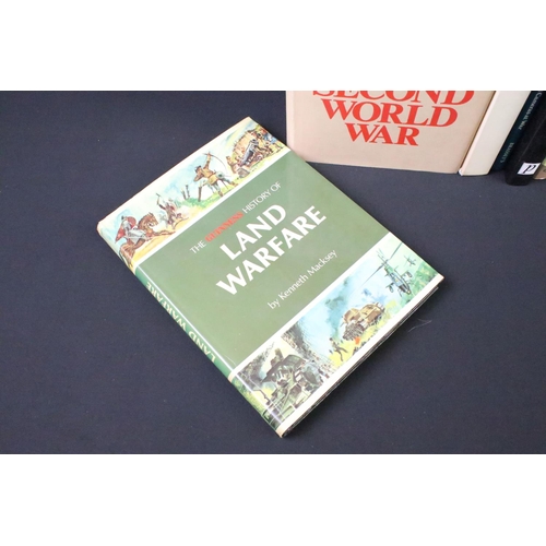 235 - A large collection of military reference books to include World War Two and Vietnam examples.