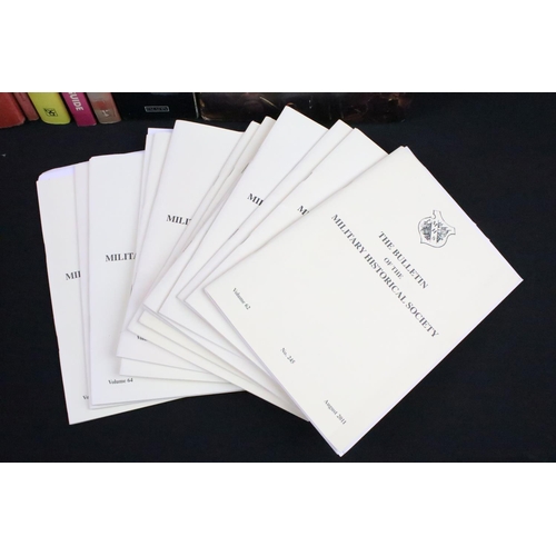 237 - A large collection of military reference books to include Badge, Button, Medal and uniform examples.