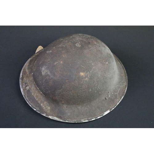 287 - Two British military helmets to include a Brodie example