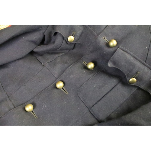 288 - A British military World War Two era jacket with cloth badges and chainmail epaulets together with a... 