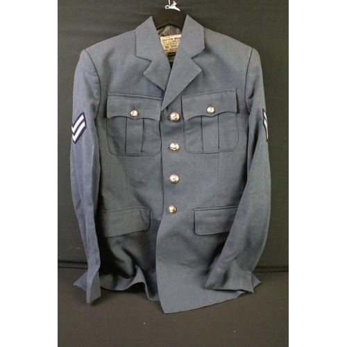 289 - A selection of British Royal Air Force / RAF uniform to include two jackets and an overcoat.