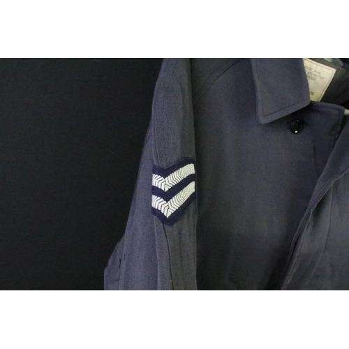 289 - A selection of British Royal Air Force / RAF uniform to include two jackets and an overcoat.